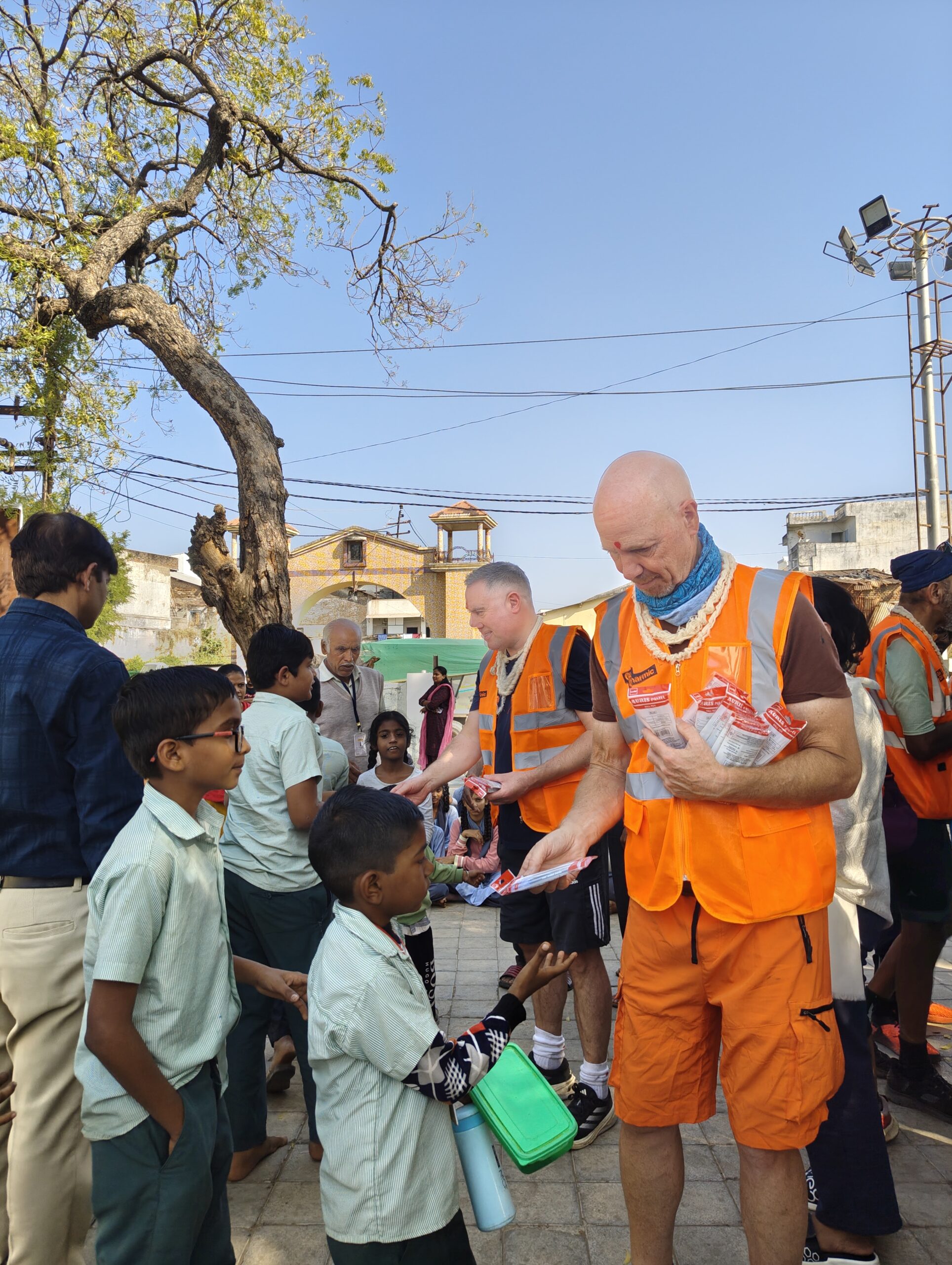 Ron serving students during a school visit in India