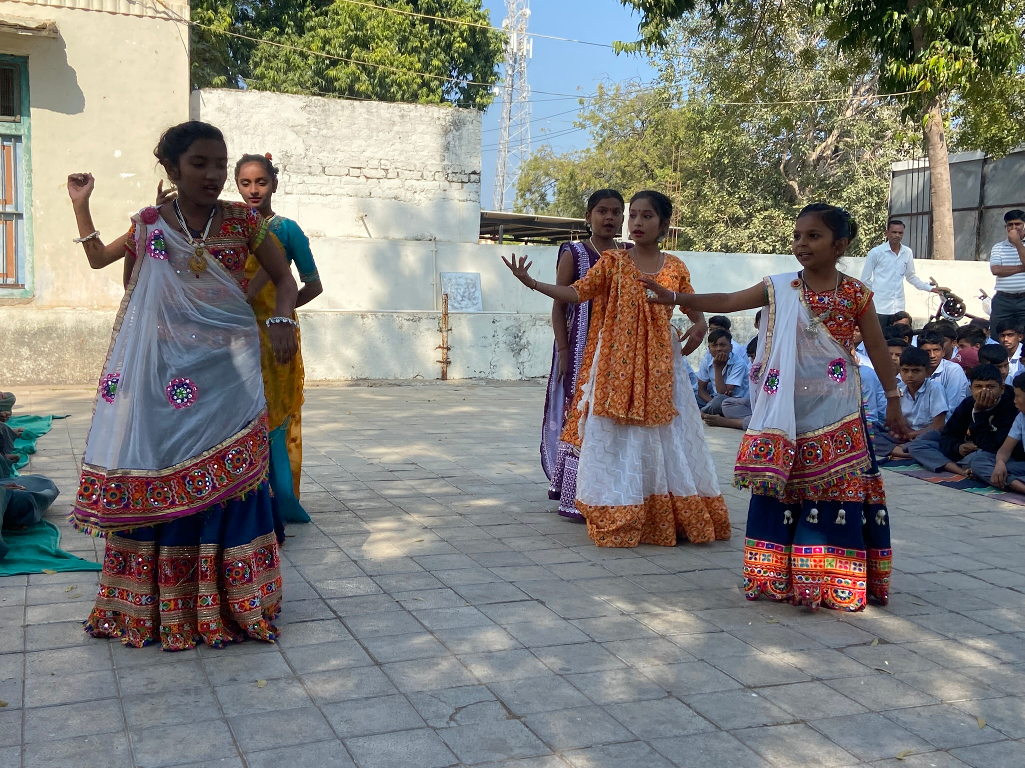 Students performing a cultural dance in India